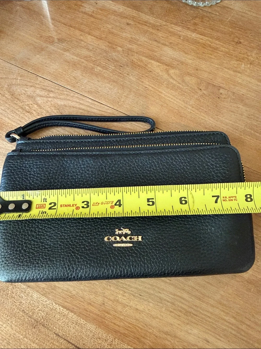 Coach Black Pebbled Leather Wristlet with Gold Logo